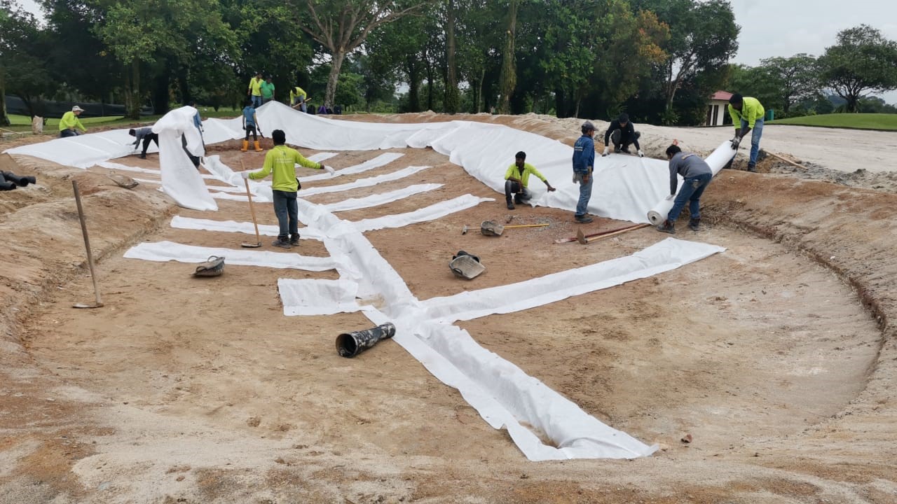 Installing geotextile fabric at Hole #4
